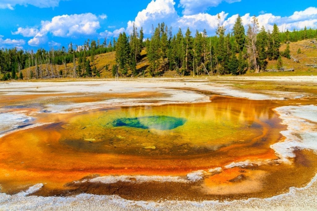 Grand Prismatic Spring shows off its red, yellow, green, and blue rings in Yellowstone National Park in Wyoming