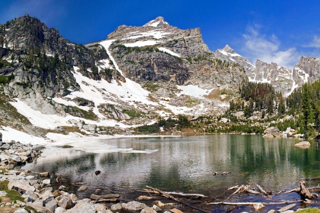 Snowy mountain and lake at Amphitheater Lake in Grand Teton