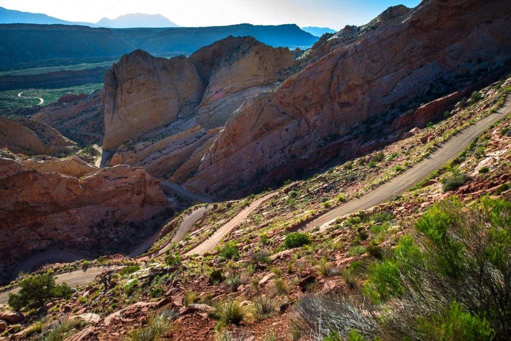 Winding road amongst rocky mountains in Capitol reef National Park