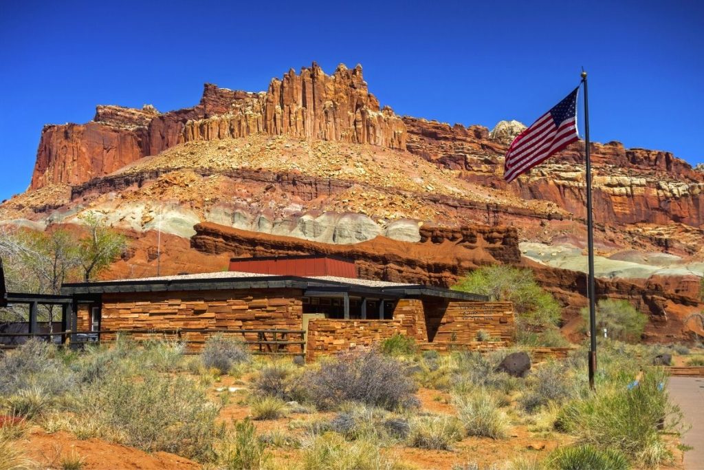 Visitor Center in the foreground with mountains in the background in Capitol Reef