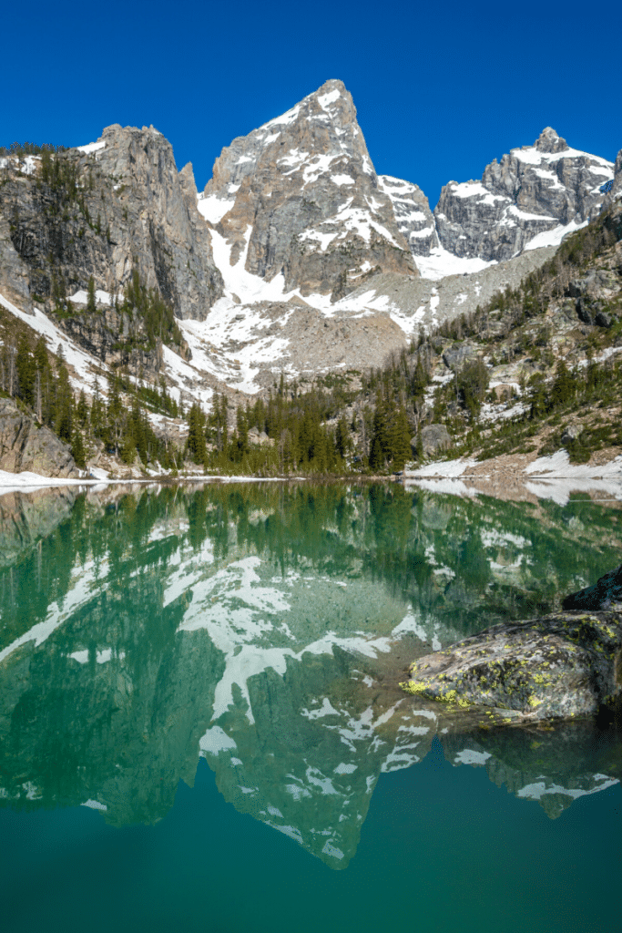 Turquoise lake and mountain peak at Delta Lake in Grand Teton