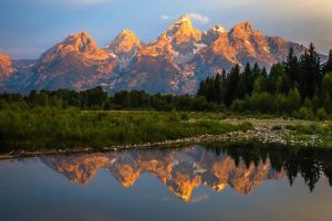 Grand Tetons reflected in the lake in Grand Teton National Park