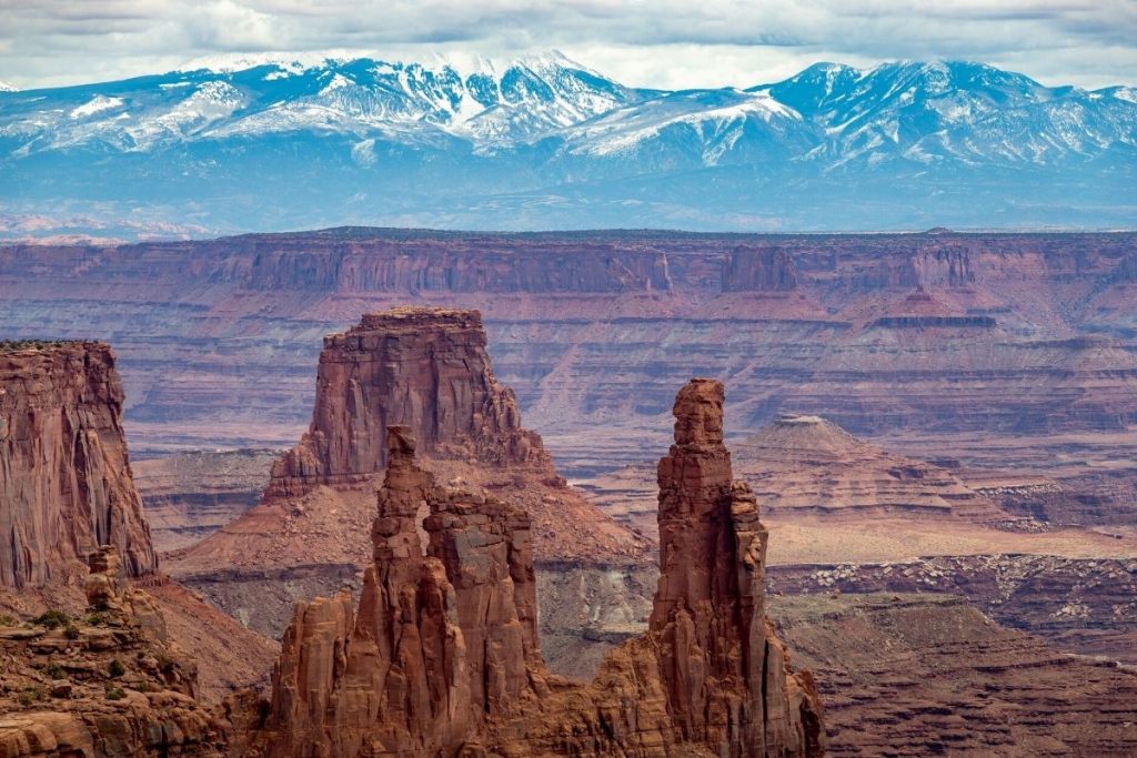 Rock formations and mountains in the distance in Canyonlands