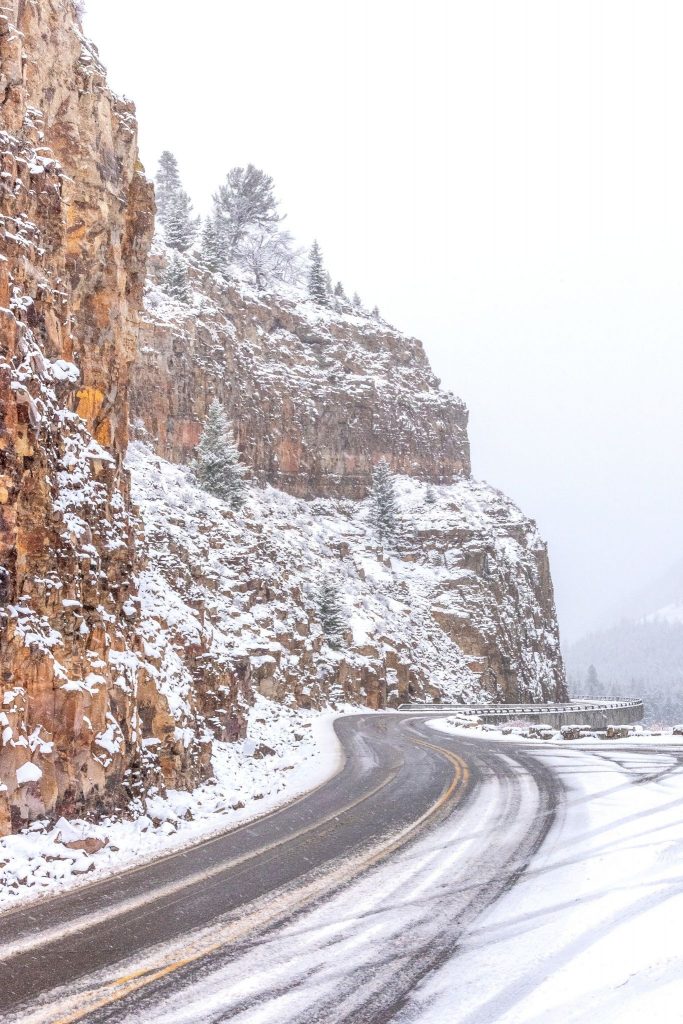 Plowed but snowy road in Yellowstone National Park in Spring