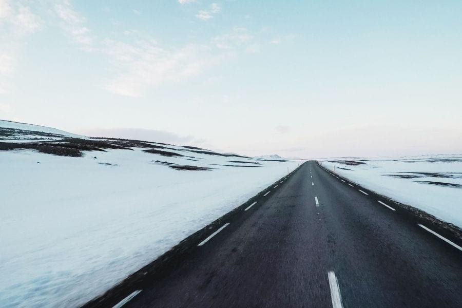 Snow covered road on a winter road trip